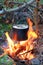 Kettle on tourist camp fire