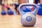 Kettlebel. kettlebell in gym on floor. Toned image