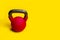 Kettlebell with Blue background yellow text space on a for isolated iron, for object lifting from black from healthy gym