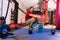 Kettlebell man pistol squat balance at gym