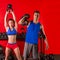 Kettlebell swing workout training group at gym