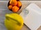 Kettlebell, tangerines, scales and glass of water