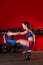 Kettlebell woman pistol squat balance at gym