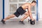 Kettlebells training crossfit - man in a gym