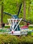 Keukenhof, Lisse, Netherlands - Apr 28th 2019: Windmill surrounded by colorful flowers in famous Keukenhof gardens. People