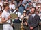 Kevin Anderson, South African player, holding his plate on centre court as runner up in the Wimbledon mens finals