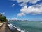 Kewalo Basin point in Honolulu with Diamond Head, and surrounding Waikiki Hotels in the distance