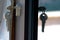 Key in a balcony door lock close up