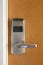 Key card electronic lock on wooden door