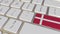 Key with flag of Denmark on the computer keyboard switches to key with flag of France, translation or relocation related