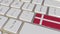 Key with flag of Denmark on the computer keyboard switches to key with flag of Great Britain, translation or relocation