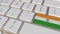 Key with flag of India on the keyboard switches to key with flag of Germany, translation or relocation related animation