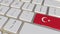 Key with flag of Turkey on the computer keyboard switches to key with flag of France, translation or relocation related