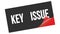 KEY    ISSUE text on black red sticker stamp