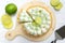 Key lime cheese tart with whipping cream on top