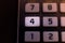 Key number four of the keyboard of a scientific calculator