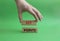 Key points symbol. Wooden blocks with words Key points. Beautiful green background. Businessman hand. Business and Key points