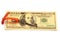 Key To Success With Red Bow on Golden hundred dollar bill