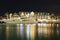 Key West hotel and yacht illuminated at night, Florida