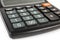 Keyboard of electronic desk calculator close-up in selective focus