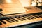 Keyboard with instrumental sheet music and soft lights for Christmas holiday, split tone