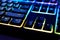 Keyboard with RGB light. Backlit keyboard, close-up. Colorful gaming devices