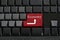 Keypad of black keyboard and have text Economy on enter button.