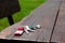 Keys forgotten on wooden bench outdoors. Lost and found