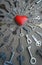 Keys strive to the red heart, vertical conceptual photo