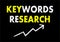 Keywords research writing text on black chalkboard. Technology concept