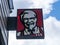 A KFC Colonel Sanders logo sign outside a KFC restaurant