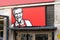 KFC Kentucky Fried Chicken fast food restaurant chain signage logo closeup, Colonel Sanders, building entrance brand symbol detail