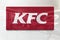 Kfc kentucky fried chicken on glossy office wall realistic texture