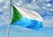 Khabarovsk Krai region of Russia Flag waving with sky on background realistic 3d illustration