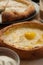 Khachapuri in Ajarian and Megrelian on a vertical photo
