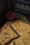 Khachapuri with meat on a wooden background