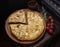 Khachapuri with meat on a wooden background