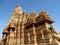 Khajuraho Temple Group of Monuments in India with erotic sculptures on the wall