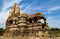 Khajuraho Temple Group of Monuments in India with erotic sculptures on the wall