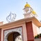 Khanda Sikh holy religious symbol at gurudwara entrance with bright blue sky image is taken at Sis Ganj Sahib Gurudwara in Chandni