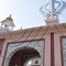 Khanda Sikh holy religious symbol at gurudwara entrance with bright blue sky image is taken at Sis Ganj Sahib Gurudwara in Chandni