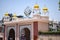 Khanda Sikh holy religious symbol at gurudwara entrance with bright blue sky image is taken at Sis Ganj Sahib Gurudwara in Chandni