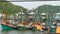 Khanom, Thailand - September 21, 2018. Rusty boats at coast. Old rusty ships parked at port in Fisherman city. Fishing