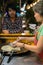 Khaolak, Thailand, 5 june 2019: ute Thai woman cooking and selling traditional Thai sweet pancakes Roti on the street of