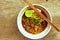 Khaosoi thai northern food on the wood background