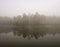 Khaoyai National part A thick early morning fog on this lake in Khaoyai Park, In Thailand.