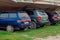 Kharkiv, Ukraine, August, 2019 Car parking under shelter canopy. Temporarily mounted park station near industrial complex with few