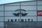 KHARKOV, UKRAINE - AUGUST 5, 2019: Infiniti showroom building exterior with big logo in evening daytime