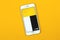 Kharkov, Ukraine - February 5, 2021: Yandex Go Taxi app on Apple smartphone, delivery service flat lay background, copy space