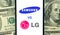 Kharkov, Ukraine - January 28, 2021: Samsung and LG Electronics logo. Dollar bills background. Business company and